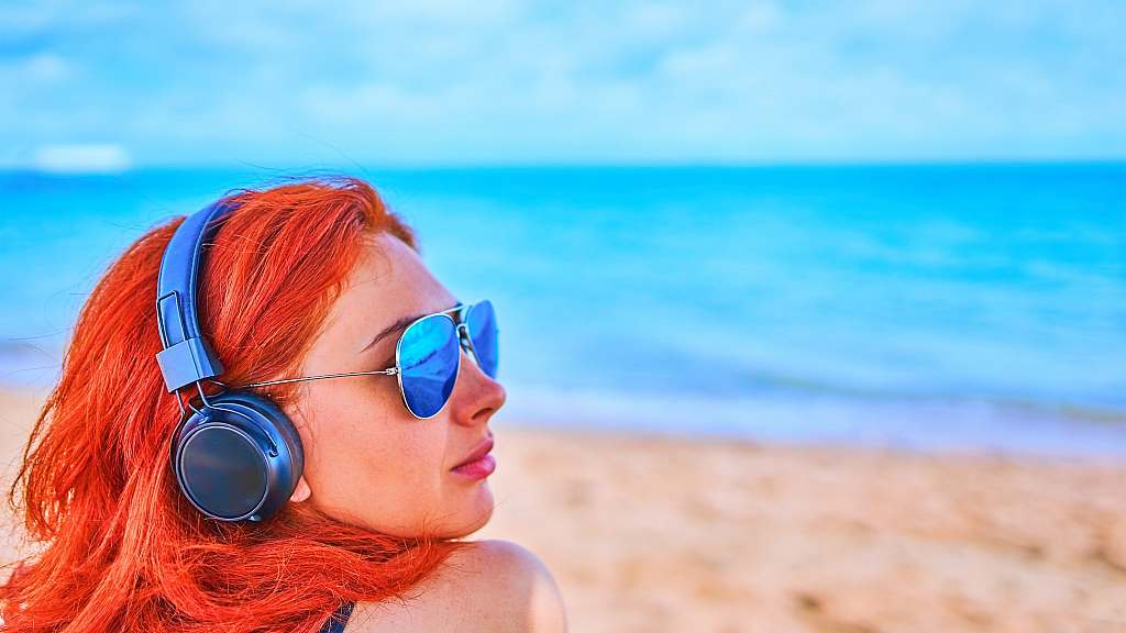 Australian women listening to a podcast